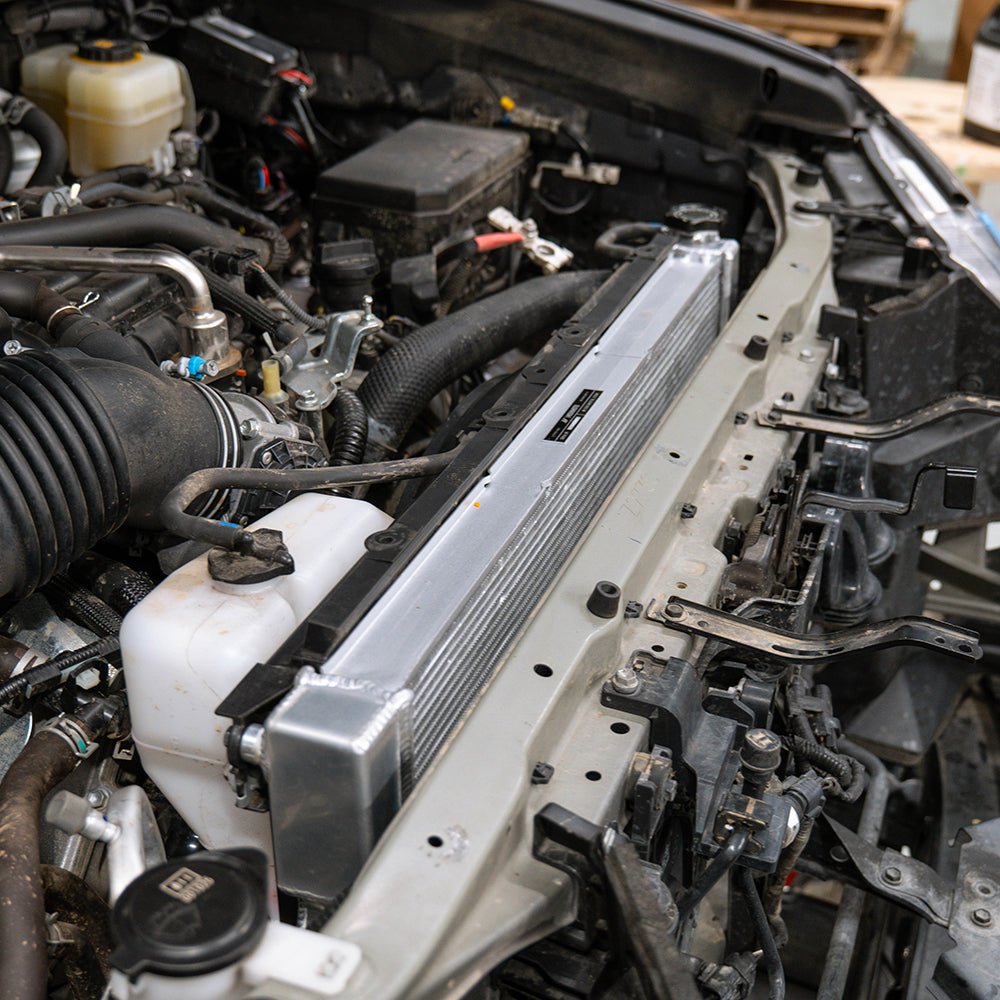 Mishimoto 10-23 Lexus GX460 4.6L Performance Aluminum Radiator - MMRAD-GX460-10 for 2010-2023 Lexus GX - front view