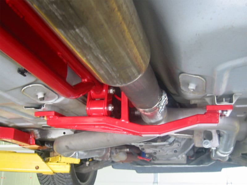 UMI Performance 93-02 GM F-Body Tunnel Mounted Trq. Arm- LT Headers w/ Loop - Red - 2203-R for 1993-2002 Chevrolet Camaro - product photo