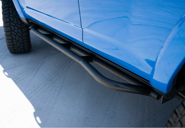 Cali Raised 10-24 Toyota 4Runner Trail Edition Bolt On Rock Sliders - Kick Out / BedLiner - CR2701 - front view