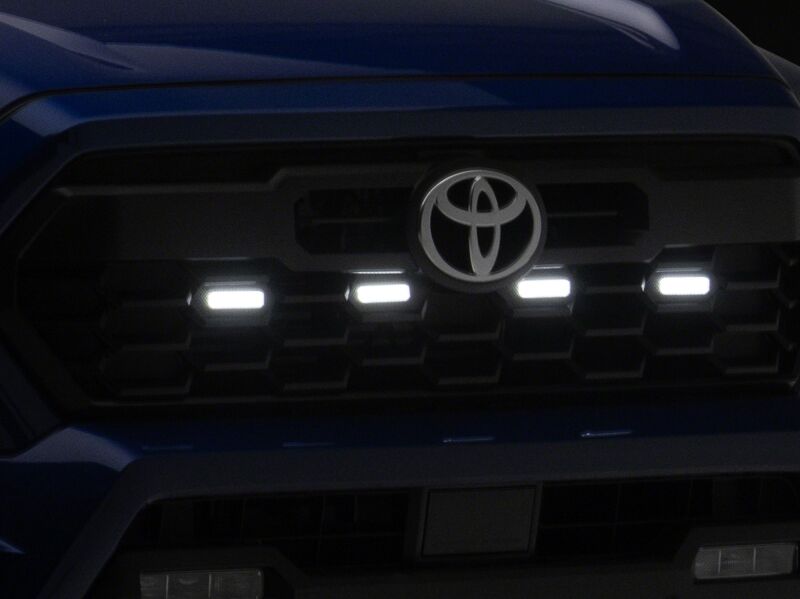 Raxiom 24-26 Toyota Tacoma Pre Runner/TRD Off-Road/TRD Sport White LED Grille Light- Smoked Lens - TT65016 - close-up view