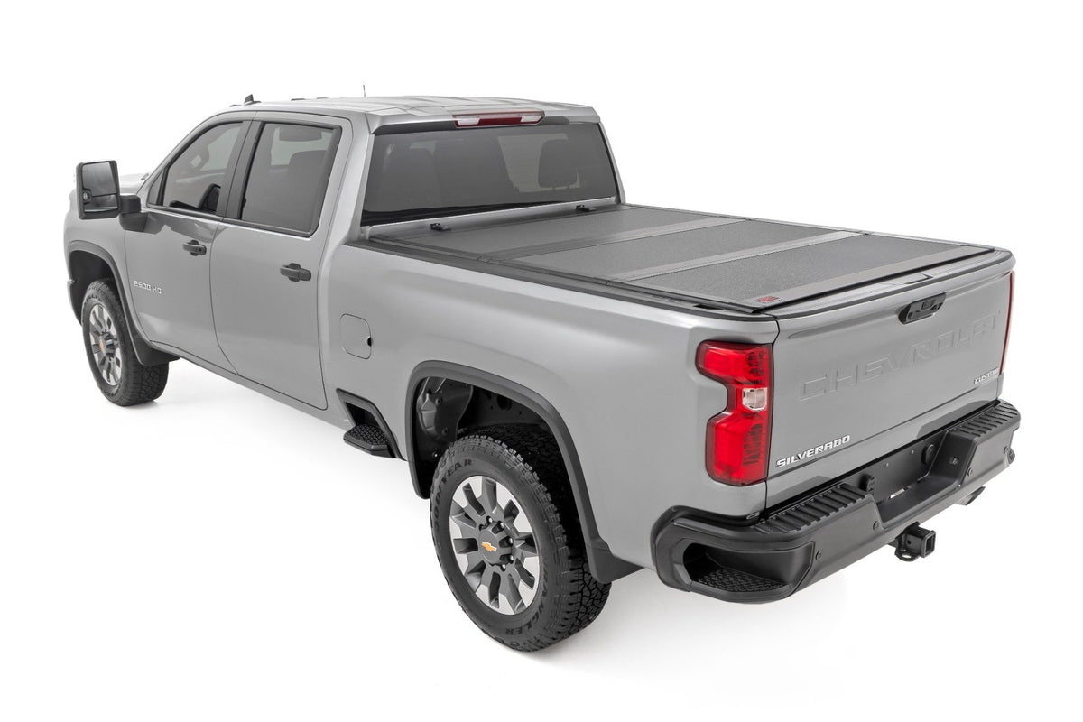 Hard Tri-Fold Flip Up Bed Cover | 6&#39;9&quot; Bed | Chevy/GMC  Silverado/Sierra 2500HD/3500HD (20-24)