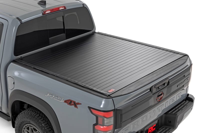 Rough Country - Hard Roll Up Bed Cover - 5' Bed - Nissan Frontier 2WD/4WD (2022-2025) - 50215522 by Rough Country - front vie