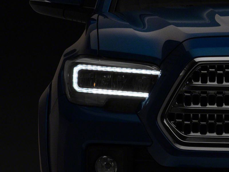 Raxiom 16-23 Toyota Tacoma w/ Factory Halogen DRL LED Headlights- Blk Housing (Clear Lens) - TT8291