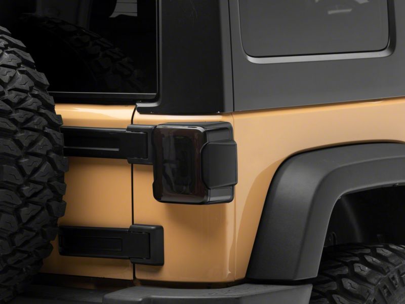 Raxiom 07-18 Jeep Wrangler JK Axial Series LED Tail Lights- Blk Housing (Smoked Lens) - J183262