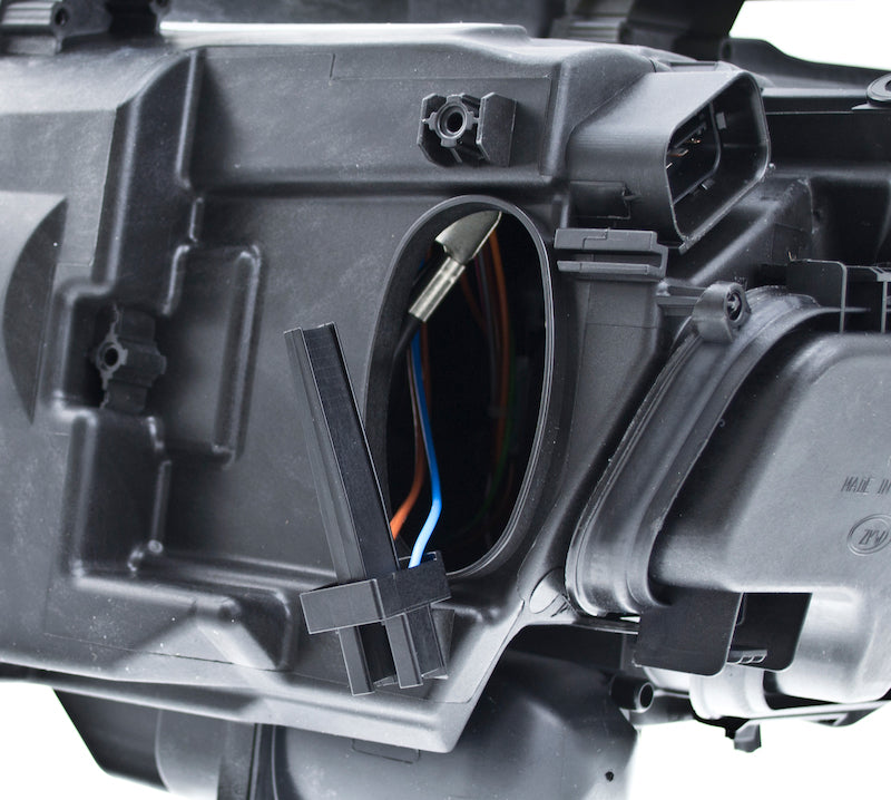 Hella 2006-2008 BMW 323i Bi-Xenon Headlight Assembly - 354688061