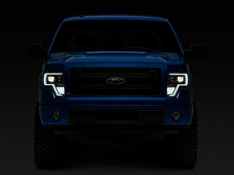 Raxiom 09-14 Ford F-150 Axial G4 Light Bar Switchback Projector Headlights- Blk Housing (Clear Lens) - T546755