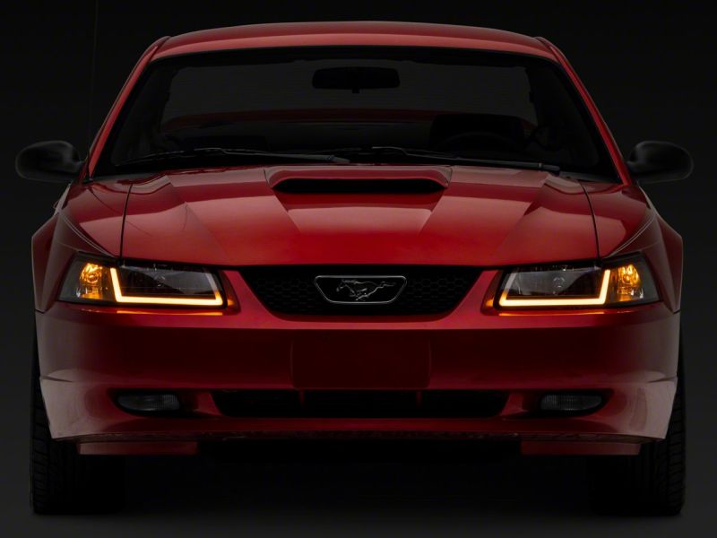 Raxiom 99-04 Ford Mustang Axial Series Headlights w/ Sequential LED Bar- Blk Housing (Clear Lens) - 422713