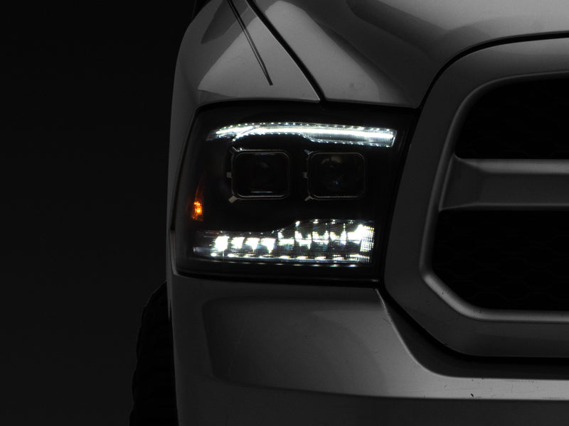 Raxiom 09-18 RAM 1500 LED Projector Headlights w/ Switchback Turn Signals- Blk Housing (Clear Lens) - R111520