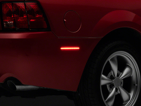 Raxiom 99-04 Ford Mustang Axial Series LED Rear Side Marker Lights- Smoked - 408818 for 1999-2004 Ford Mustang - front view