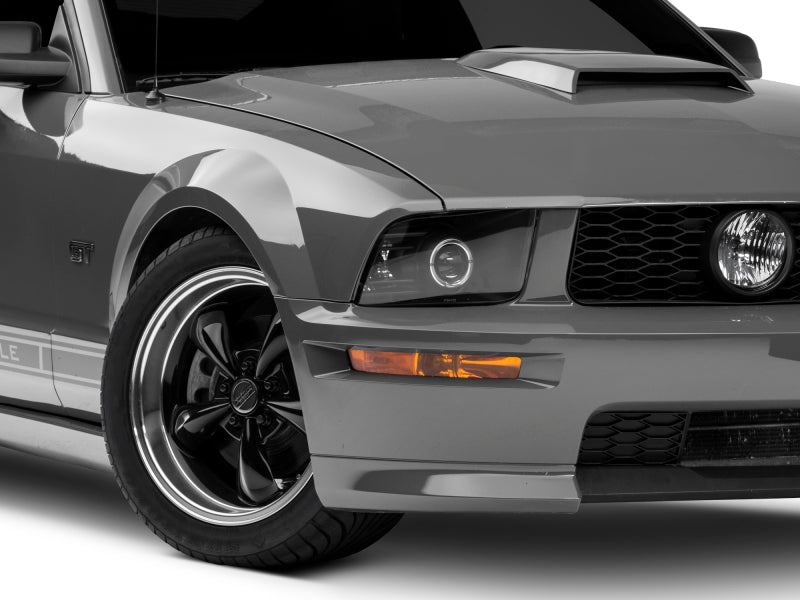 Raxiom 05-09 Ford Mustang Halogen 2010 Style LED Halo Headlights-Blk Hsng(Clear Lens/Excludes GT500) - 101682