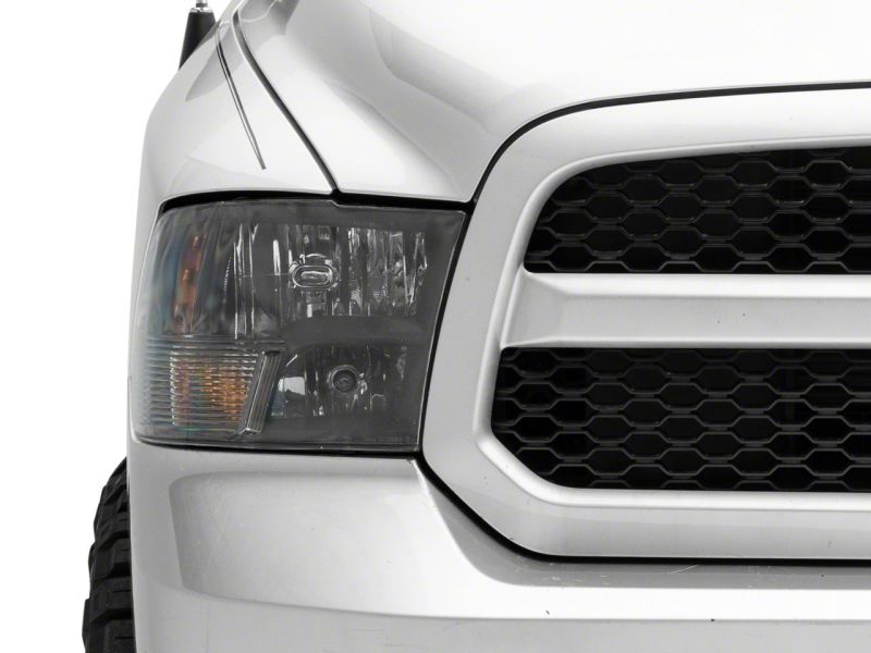 Raxiom 09-18 Dodge RAM 1500 Axial Series Euro Style Headlights w/ Dual Bulb Blk Housing (Clear Lens) - R118016
