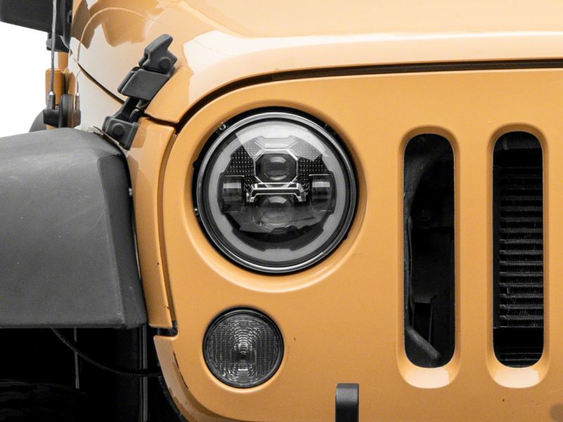 Raxiom 07-18 Jeep Wrangler JK Axial 7-In LED Headlights w/ DRL Turn Signals- Blk Housing (Clear) - J173078