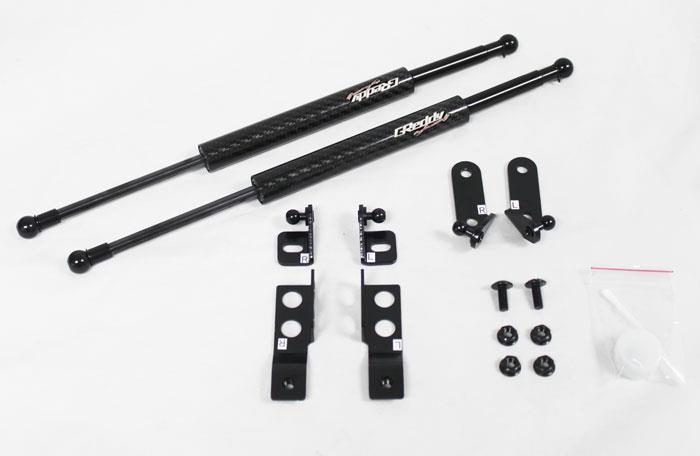 GReddy 08-11 Mitsubishi Evo X CZ4A Engine Hood Lifter Kit (Designed for OEM weight hoods.) - 18530101