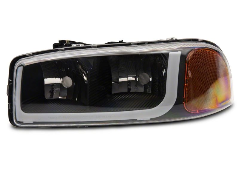Raxiom 99-06 GMC Sierra 1500 Axial Series Headlights w/ LED Bar- Blk Housing (Clear Lens) - S531789