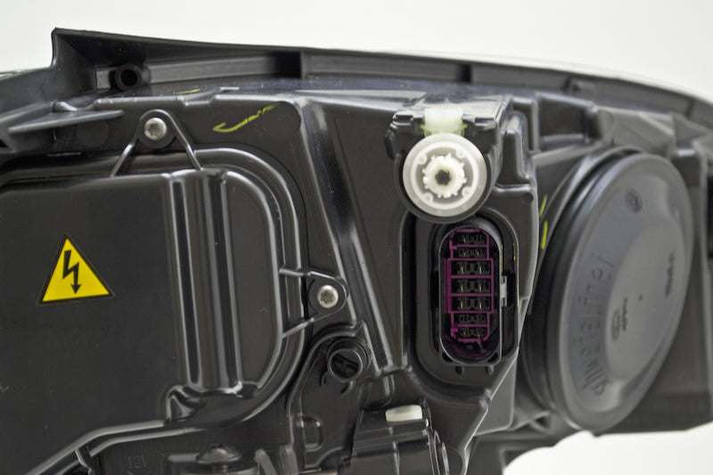 Hella 2013-2020 Volkswagen Golf Bi-Xenon Headlight Assembly - 011956271