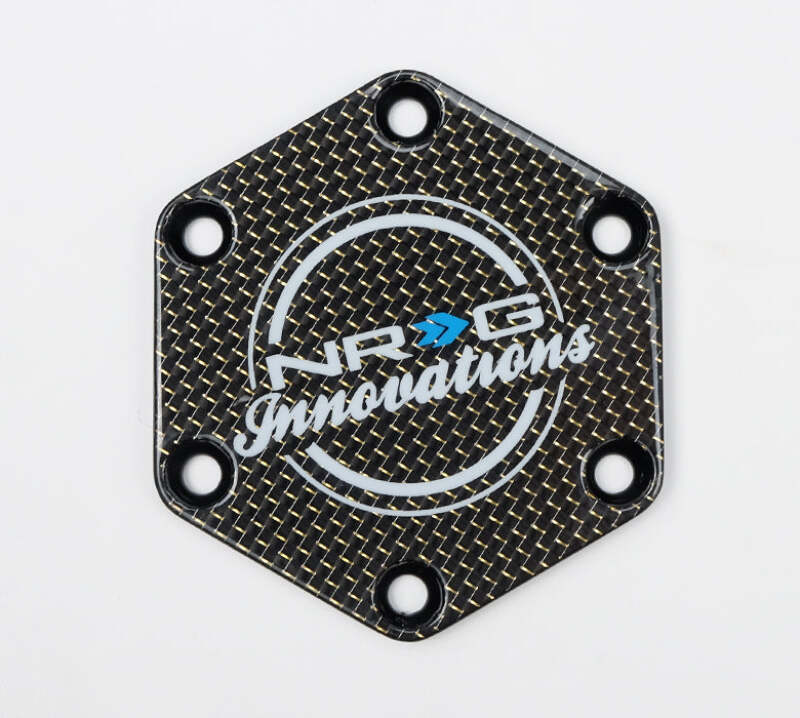 NRG Carbon Fiber w/ Chrome Gold Texalium Fabrics Horn Delete Button Circular Logo Front/ Back - STR-640CF/CG - close-up view