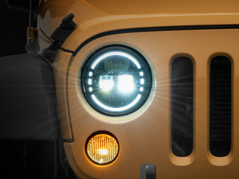 Raxiom 97-18 Jeep Wrangler TJ/JK Axial 7-Inch LED Headlights w/ DRL- Black Housing (Clear Lens) - J155570