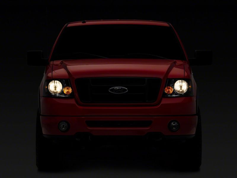 Raxiom 04-08 Ford F-150 Axial Series OEM Style Replacement Headlights- Chrome Housing- Smoked Lens - T551342