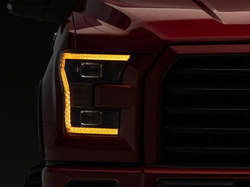 Raxiom 15-17 Ford F-150 LED Projector Headlights with LED Amber DRL- Black Housing- Clear Lens - T558778 - close-up view 9