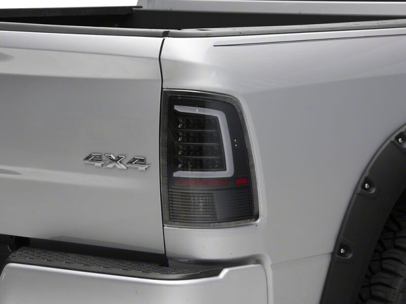 Raxiom 09-18 Dodge RAM 1500 Axial Series LED Tail Lights- Black Housing- Clear Lens - R113541 - front view