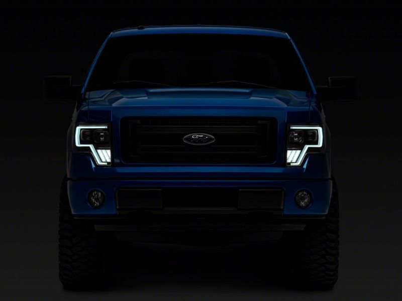 Raxiom 09-14 Ford F-150 Axial G4 Light Bar Switchback Projector Headlights- Blk Housing (Clear Lens) - T546755
