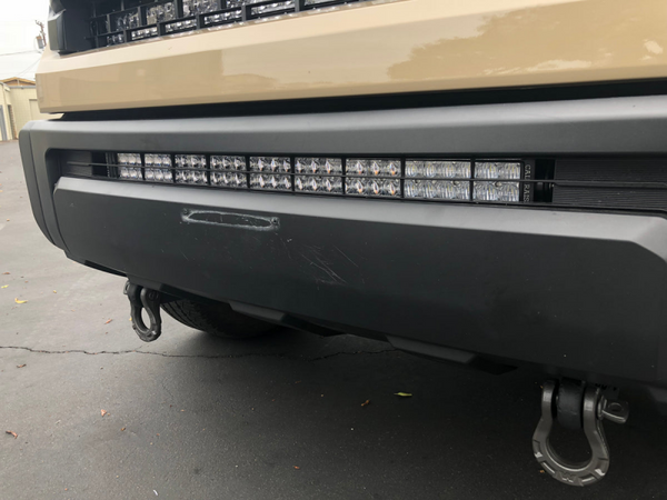 Cali Raised 14-21 Toyota Tundra 32In Lower Bumper Hidden Light Bar Kit - Blue Backlight Small - CR2563 - front view