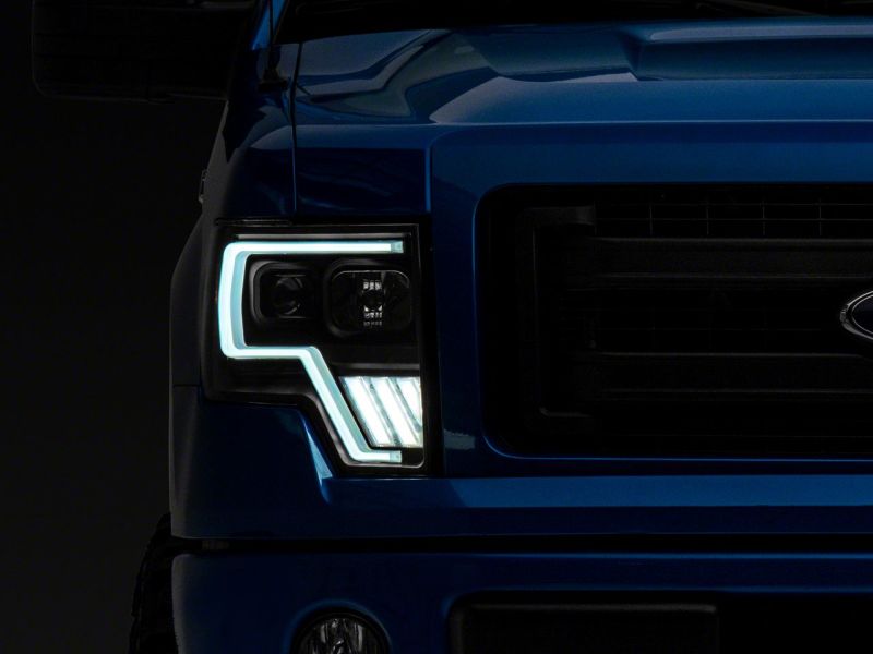 Raxiom 09-14 Ford F-150 Axial G4 Light Bar Switchback Projector Headlights- Blk Housing (Clear Lens) - T546755