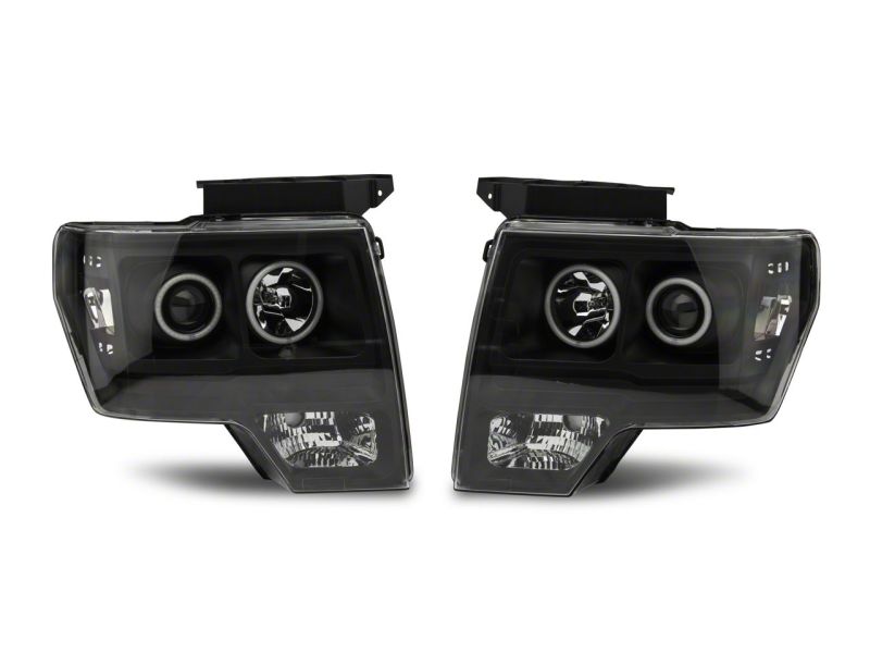 Raxiom 09-14 Ford F-150 Super White LED Halo Projector Headlights- Blk Housing (Clear Lens) - T542825