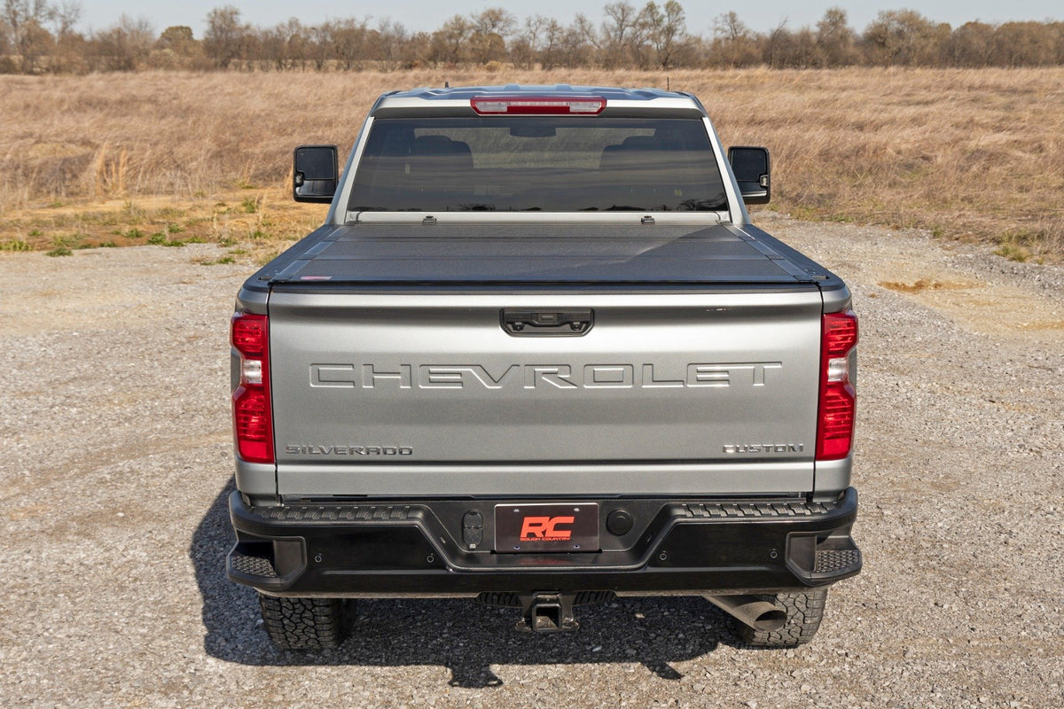 Hard Tri-Fold Flip Up Bed Cover | 6&#39;9&quot; Bed | Chevy/GMC  Silverado/Sierra 2500HD/3500HD (20-24)