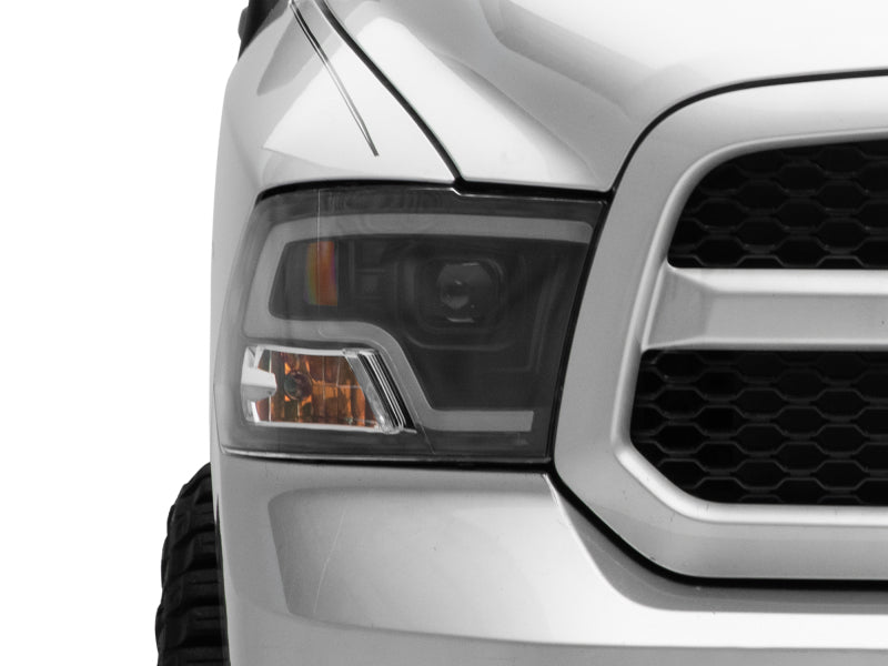 Raxiom 09-18 RAM 1500 LED Halo Projector Headlights- Black Housing (Clear Lens) - R111516