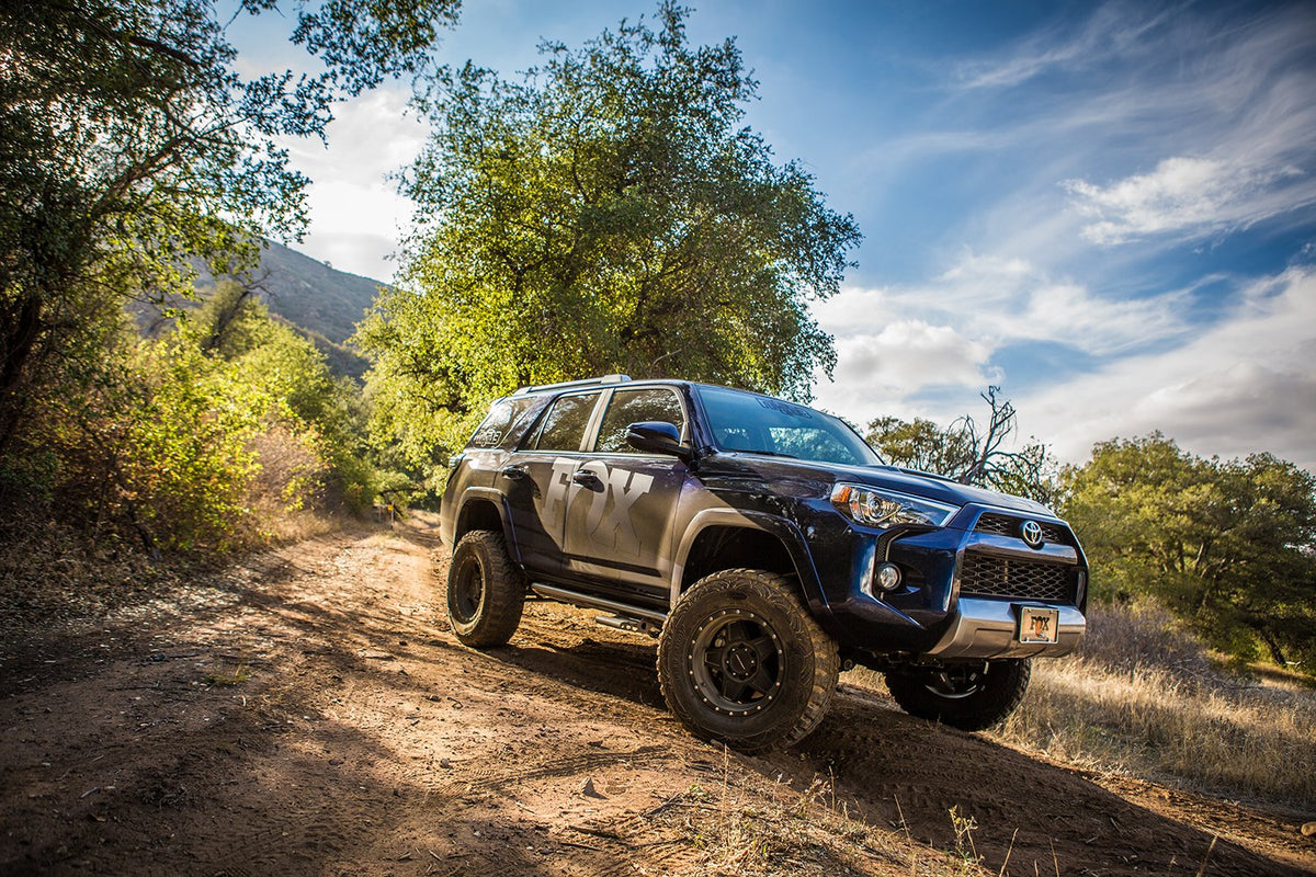 Fox 2010+ Toyota 4Runner 2.0 Performance Series 4.87in IFP Front Coilover Shock / 0-2in Lift - 985-62-001