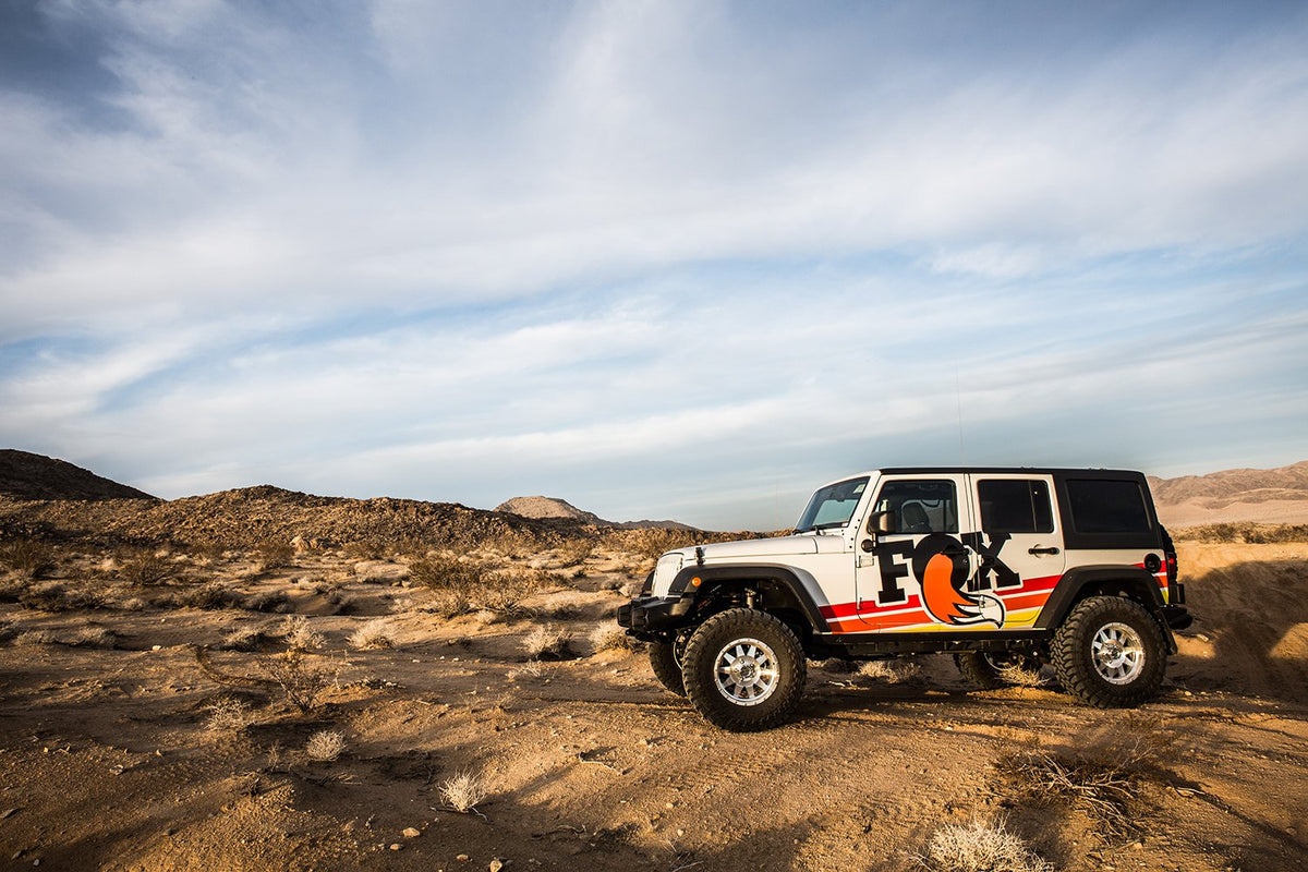Fox 97-06 Jeep TJ 2.0 Performance Series 11.1in Smooth Body IFP Front Shock (Alum) / 6.5-8in Lift - 980-24-644