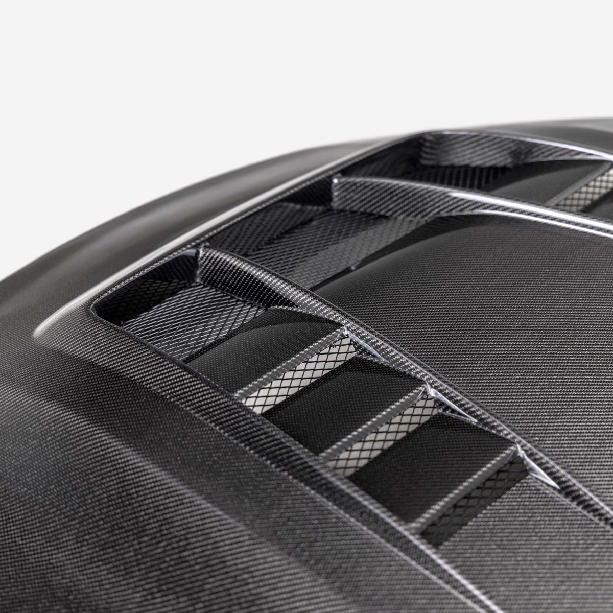 Seibon 23-25 Toyota Corolla GR TV-Style Double-Sided Carbon Fiber Hood - HD23TYGRCOR-TV-DS