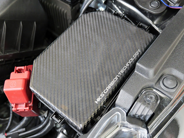 HKS 2023 Toyota GR Corolla Dry Carbon Fuse Box Cover - 70026-AT014