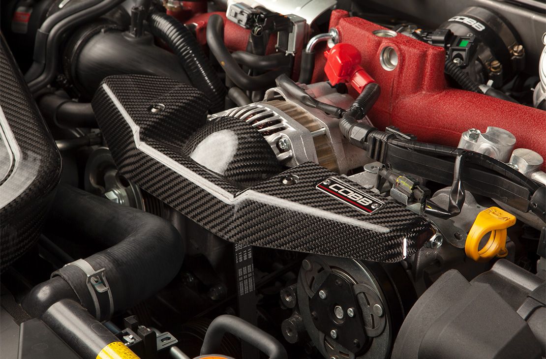 Cobb 08-21 Subaru STI/08-14 Subaru WRX Redline Carbon Fiber Alternator Cover - Gloss Finish - 422600