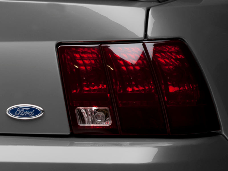 Raxiom 99-04 Ford Mustang Excluding 99-01 Cobra Tail Lights- Black Housing (Smoked Lens) - 49080