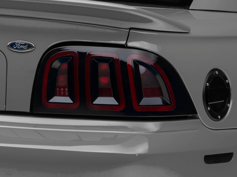 Raxiom 96-98 Ford Mustang Icon LED Tail Lights- Black Housing (Smoked Lens) - 389876