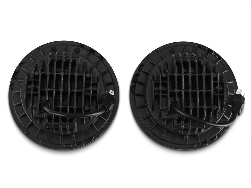Raxiom 97-18 Jeep Wrangler TJ/JK Axial Series LED Daymaker Headlights- Black Housing (Clear Lens) - J108042
