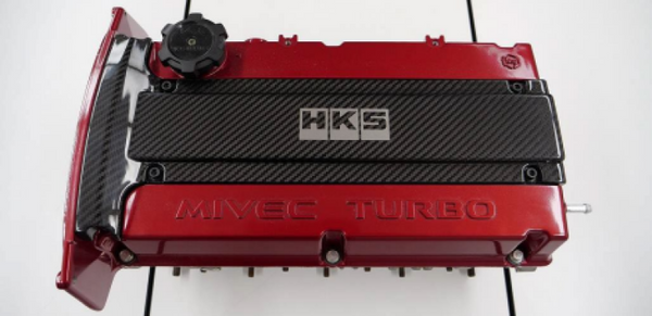 HKS CARBON PLUG COVER 4G63 (Lancer Evolution IV - IX) - 45999-AM002 by HKS - front view