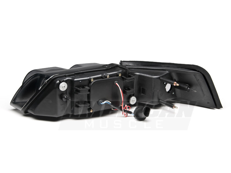 Raxiom 99-04 Ford Mustang Dual LED Halo Projector Headlights- Black Housing (Smoked Lens) - 49113