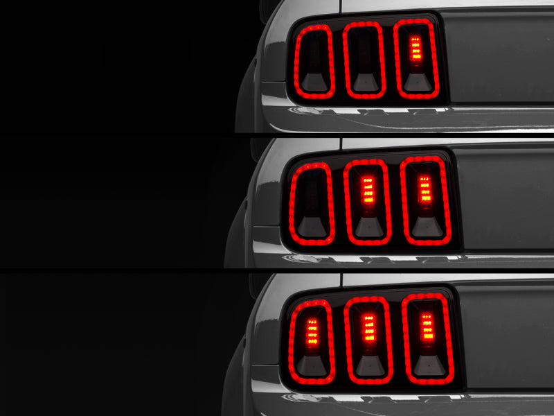 Raxiom 05-09 Ford Mustang Gen5 Tail Lights- Black Housing (Smoked Lens) - 49169